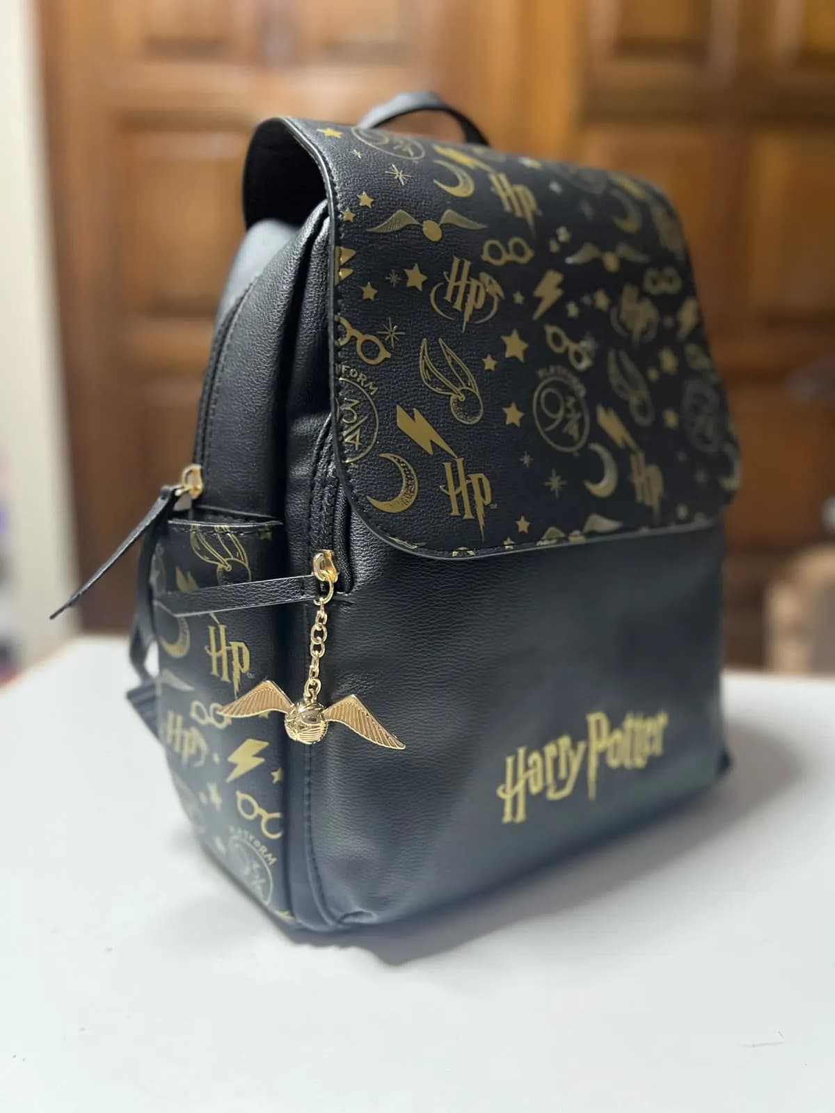 Mochila de Harry Poter Negro y Diseño Dorado
